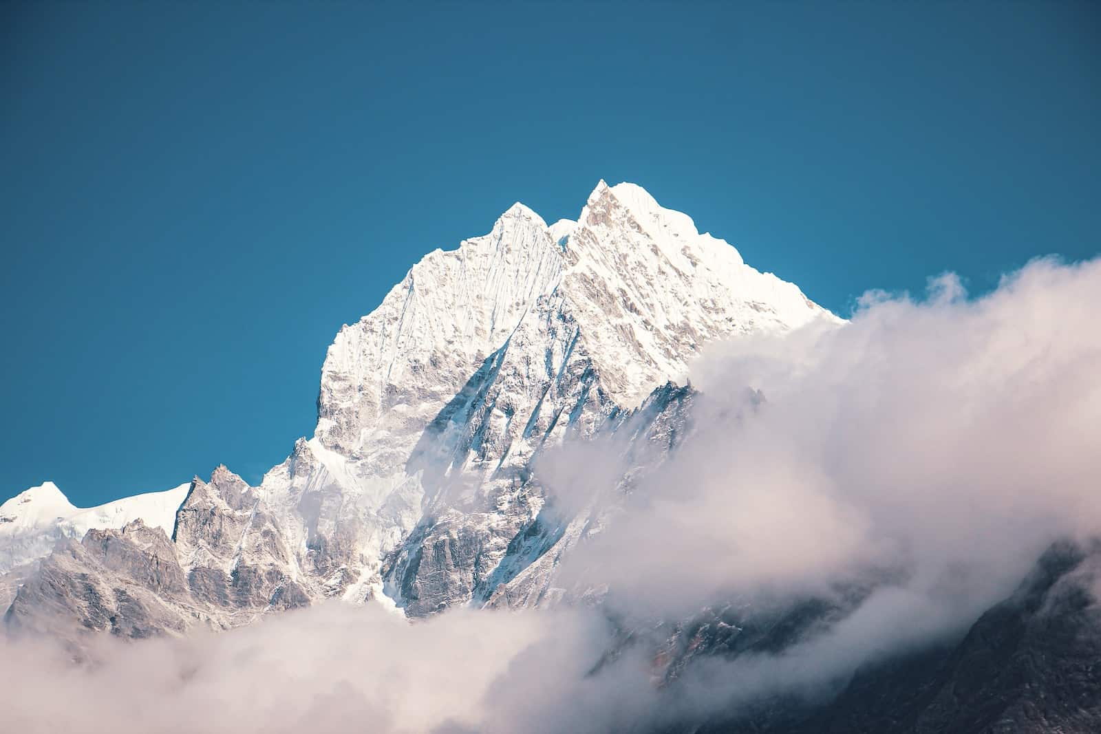 Snow Covered Mountain Under Blue Sky
